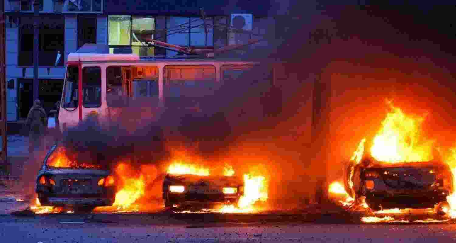 In this photo provided by the Zaporizhzhia regional military administration on Jan. 8, 2025, cars burning after a Russian air strike in Zaporizhzhia, Ukraine.