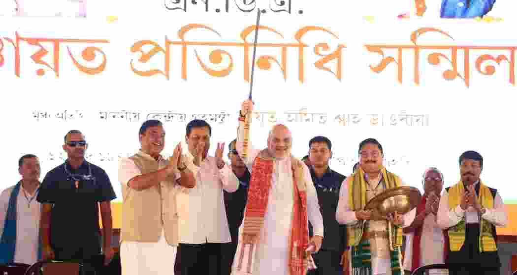 Union Home Minister Amit Shah with Union Minister Sarbananda Sonowal, Assam Chief Minister Himanta Biswa Sarma and State BJP President Dilip Saikia during the NDA Panchayat Pratinidhi Sammelan, in Guwahati.