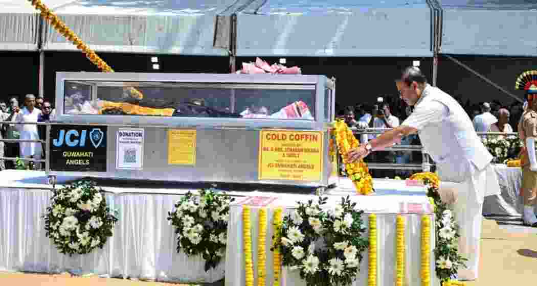 Assam Chief Minister Himanta Biswa Sarma pays his last respects to singer Zubeen Garg during his funeral, on the outskirts of Guwahati. Zubeen Garg died while scuba diving in Singapore.