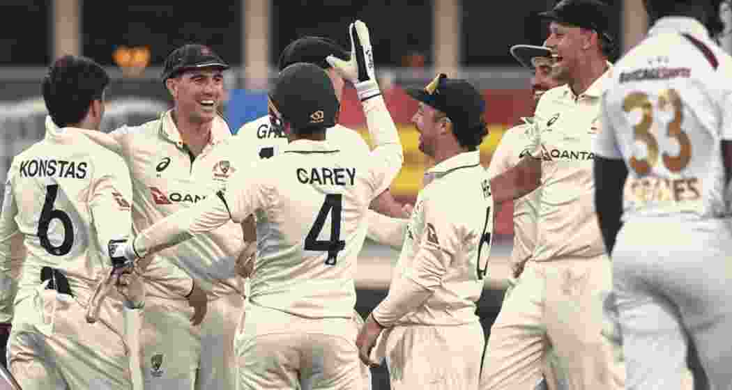 Australians celebrate after sealing a 159-run victory over the West Indies in the first Test at Bridgetown, wrapping up the match inside three days at Kensington Oval.