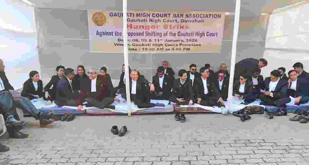 Members of the Gauhati High Court Bar Association sit on a hunger strike in front of the high court building at Uzan Bazar, protesting the proposed relocation of the court complex.