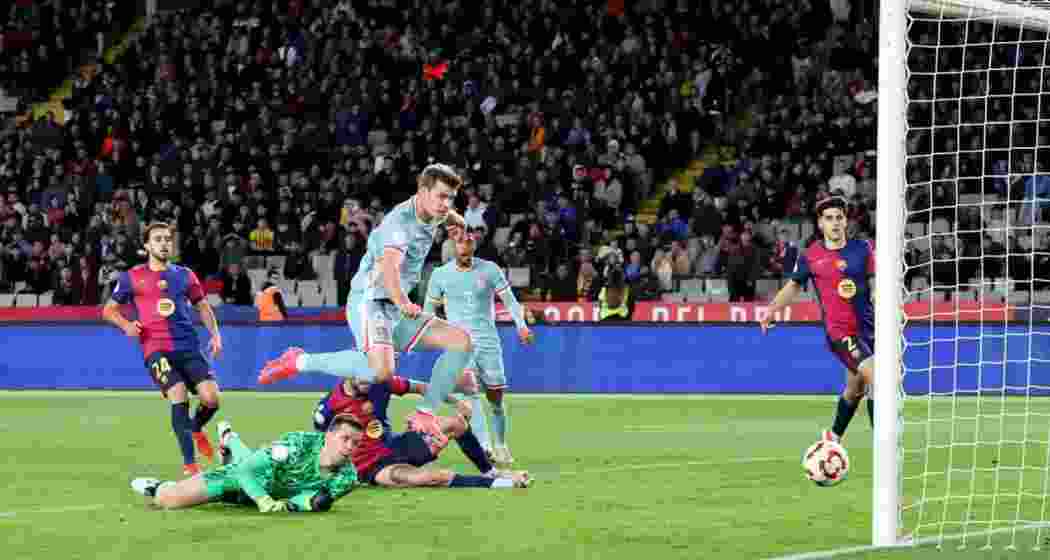 Alexander Sorloth scores Atletico Madrid’s late equaliser against Barcelona in the first leg of the Copa del Rey semi-final on February 25, 2025.