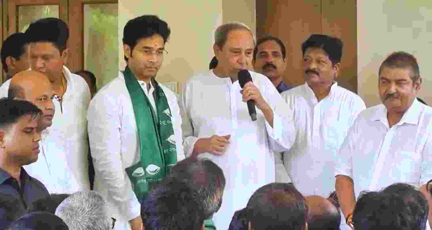 Arabinda Mohapatra with Naveen Patnaik. 