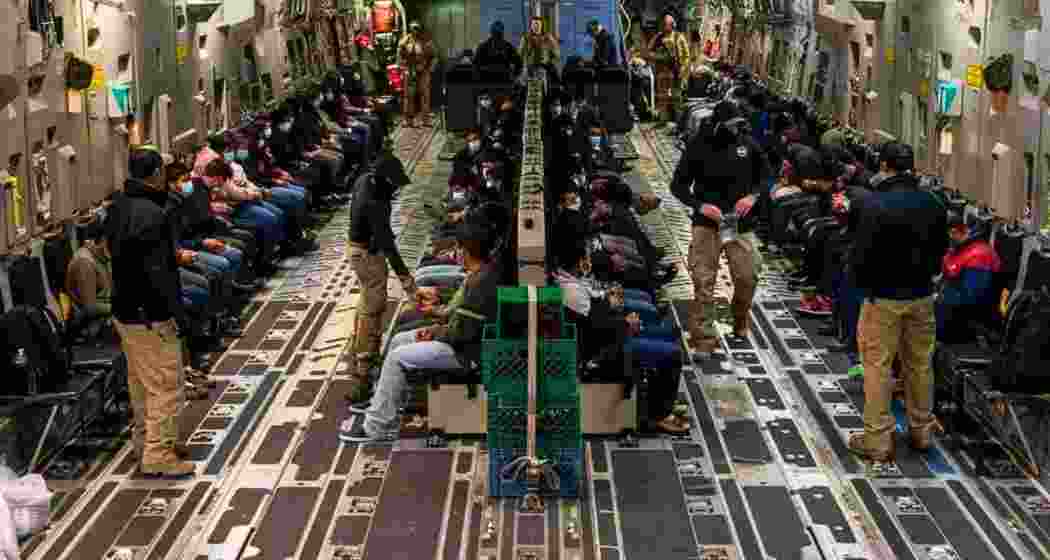 Indian deportees seated inside a US military aircraft before their arrival at Amritsar airport. File photo.