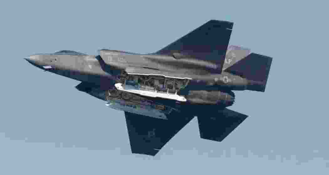 An F-35 fighter aircraft soars through the skies.