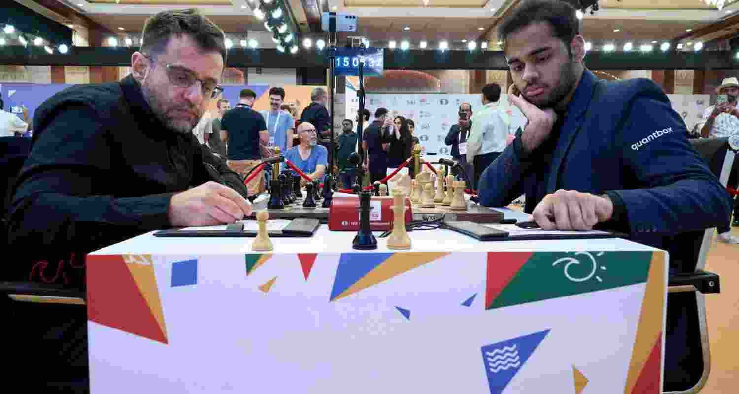 Arjun Erigaisi and Levon Aronian in action during their Round 5 Game 1 at FIDE World Cup in Panaji on Friday.