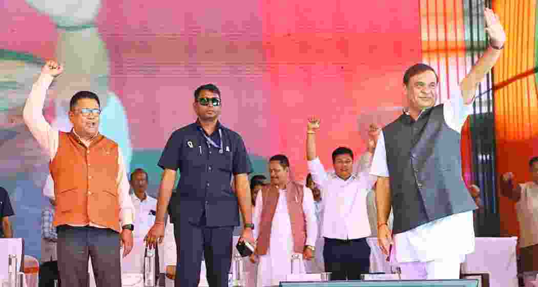 Chief Minister Himanta Biswa Sarma with cabinet minister Ranoj Pegu during an event under the Mukhya Mantri Mahila Udyamita Abhiyan in Dhemaji, Assam on Friday.