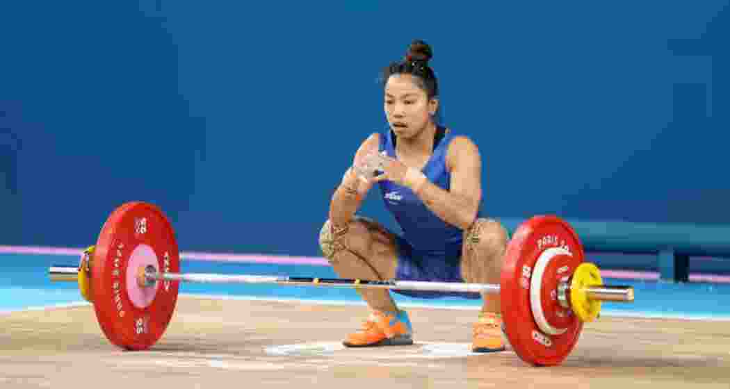 Mirabai Chanu in action during an international weightlifting competition.