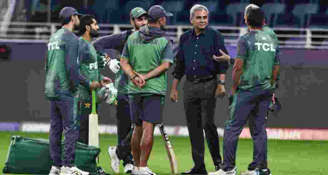 Pakistan Cricket Board Chairman Mohsin Naqvi interacts with national team players during a practice session, amid heightened security concerns and regional tensions following recent terror attacks.
