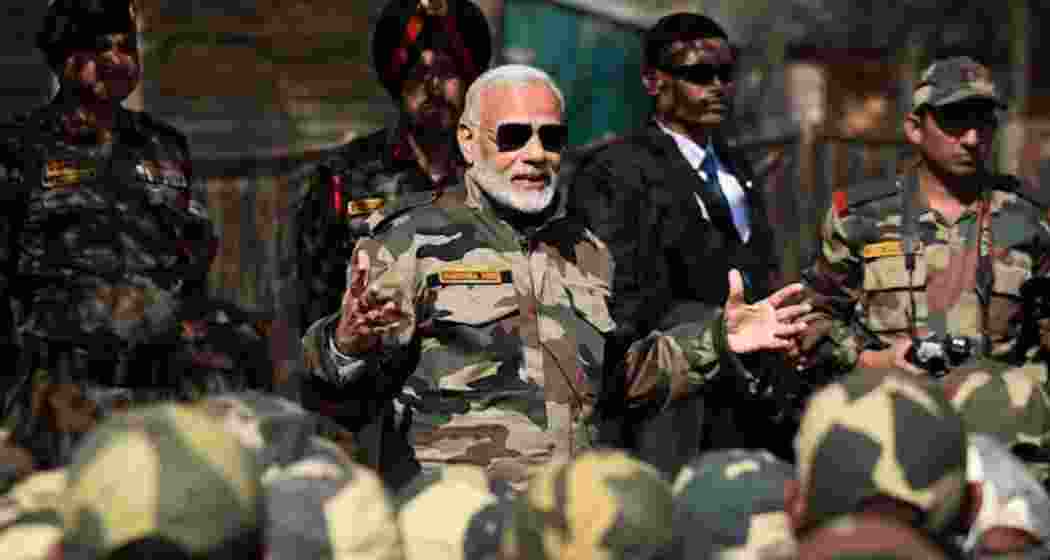 A file photo of Prime Minister Narendra Modi with Indian Army soldiers and BSF personnel.