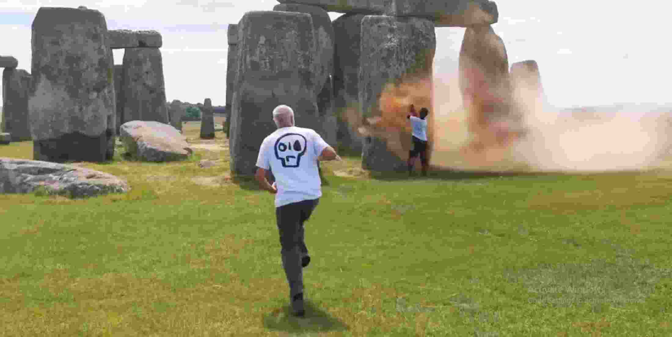 The campaigners were caught on video rushing to the stones and spraying powder paint even as visitors ran up to them shouting “no” and “stop,” before pulling them away.