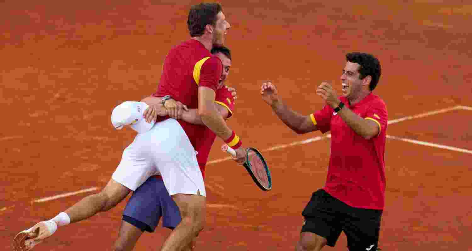 Spain's Davis Cup team celebrating their historic win against Denmark.