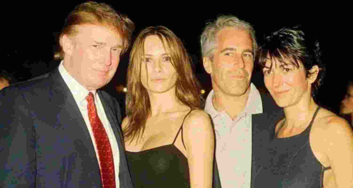 A file photo of US President Donald Trump with late sex offender Jeffrey Epstein in an undated photo. 