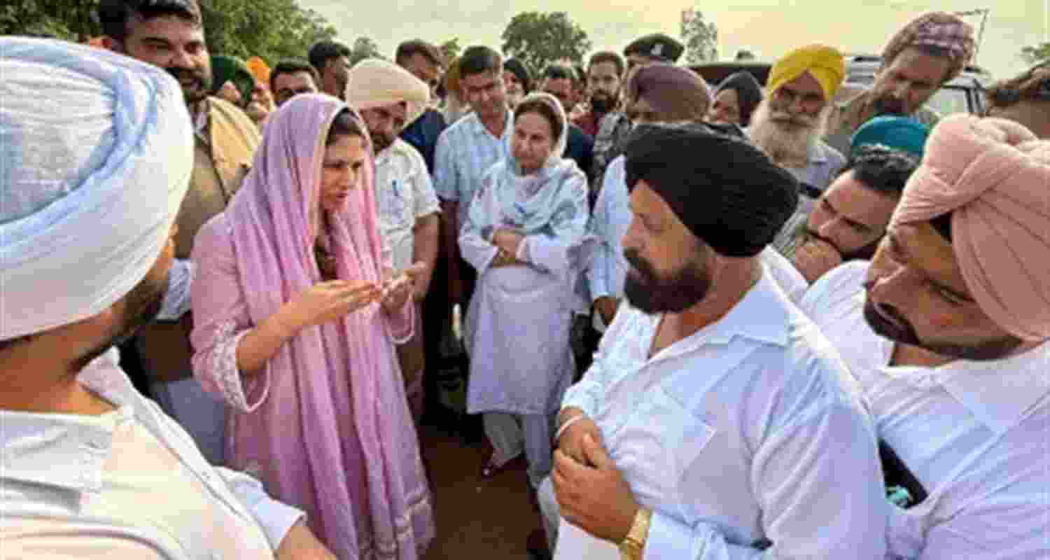 Union Minister Raksha Nikhil Khadse interacting with flood victims in a village of Patiala district.