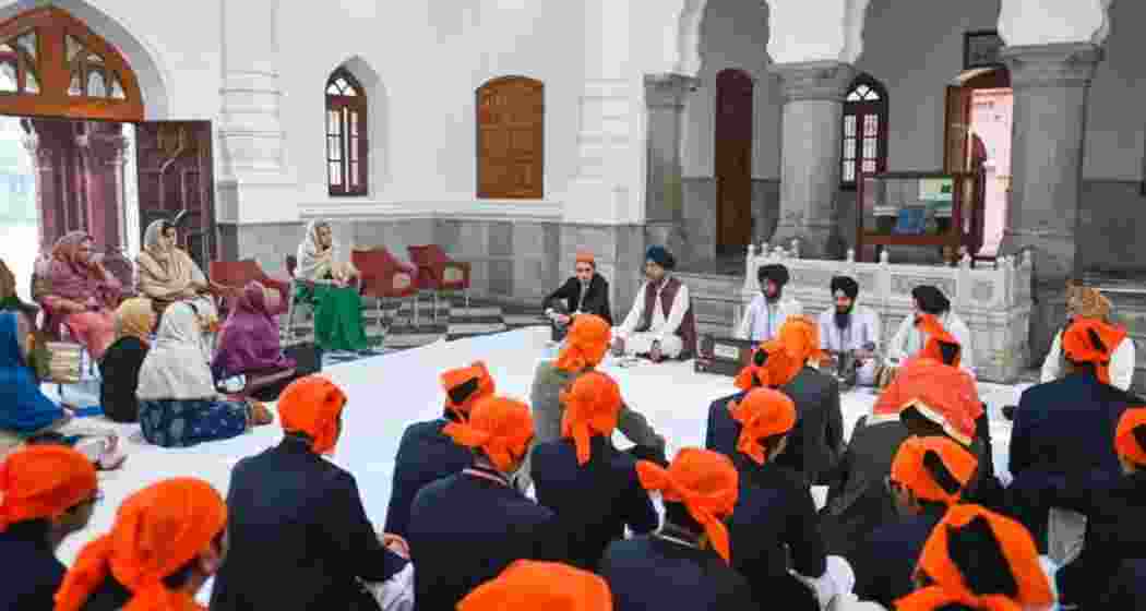 Participants attend Shabad Kirtan at Aitchison College’s historic Gurdwara Sahib in Lahore, where hymns were performed for the first time since Partition in 1947.
