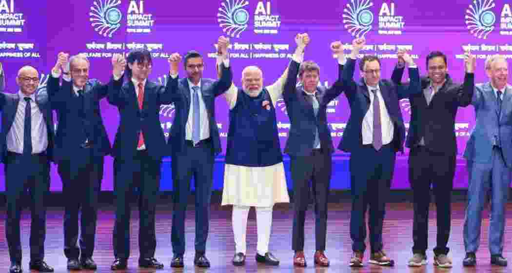 Prime Minister Narendra Modi with Google CEO Sundar Pichai, OpenAI CEO Sam Altman, Meta Chief AI Officer Alexandr Wang, and other dignitaries at AI Impact Summit 2026 at Bharat Mandapam, in New Delhi on Thursday. 