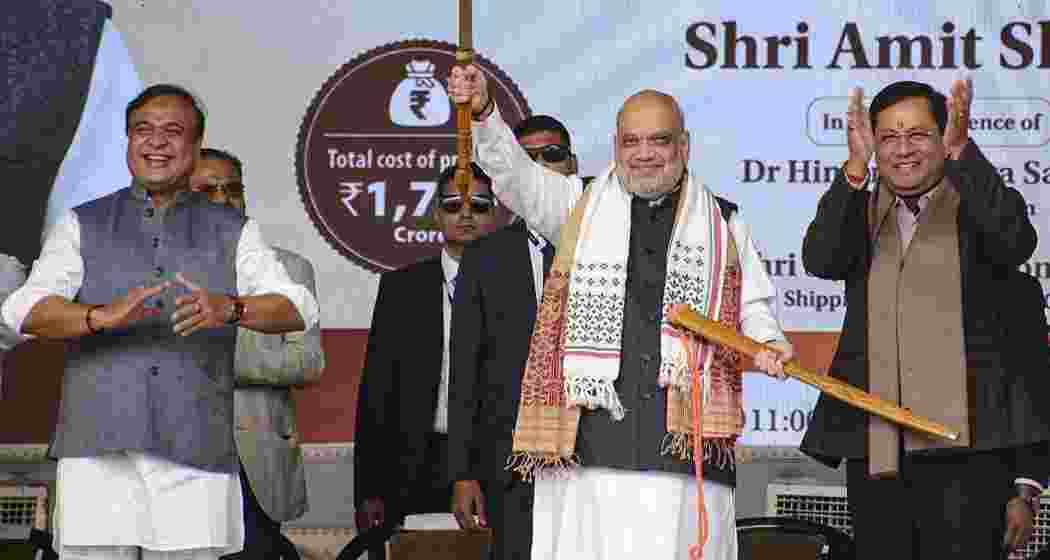 Union Home Minister Amit Shah with Union Minister Sarbananda Sonowal and Assam Chief Minister Himanta Biswa Sarma during a public meeting, in Dibrugarh on Friday.