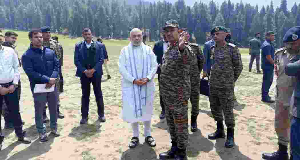 Union Home Minister Amit Shah surveys Baisaran meadow in Jammu and Kashmir's Pahalgam, where Tuesday’s terror attack occurred, as Army officials brief him on Wednesday. 
