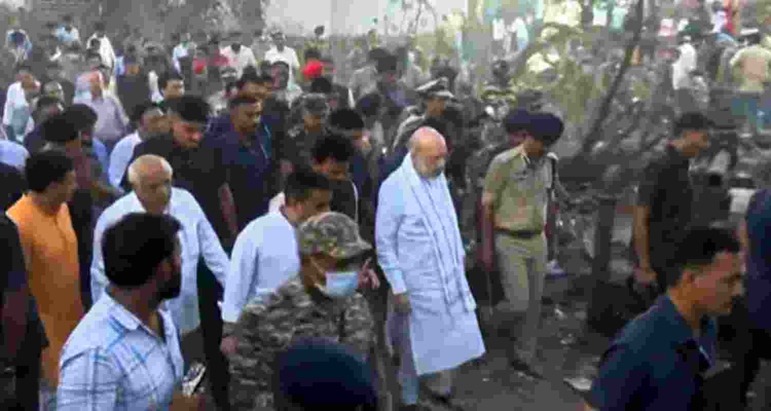Union Home Minister Amit Shah takes stock of the situation following the Air India plane crash, in Ahmedabad, Thursday.