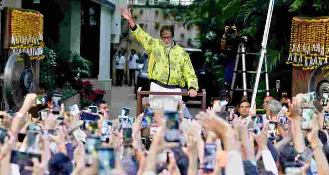 Amitabh Bachchan greets his devoted fans with a warm wave outside his Jalsa residence in Mumbai’s Juhu. File photo.