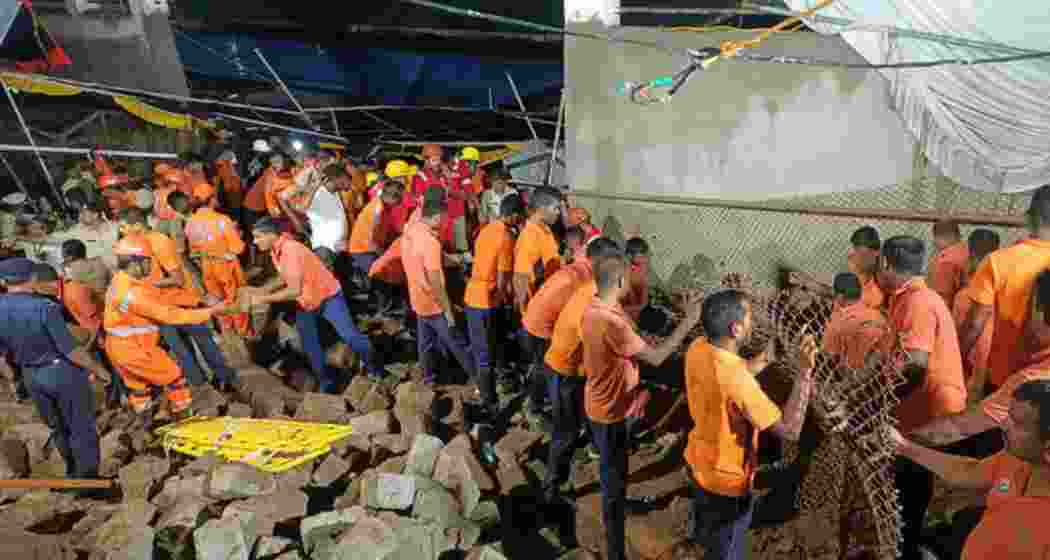 Rescue personnel at Simhachalam temple in Visakhapatnam after a wall collapsed amid Chandanotsavam festivities, killing eight and injuring four devotees awaiting Nijaroopa Darshan in the early hours of Wednesday.