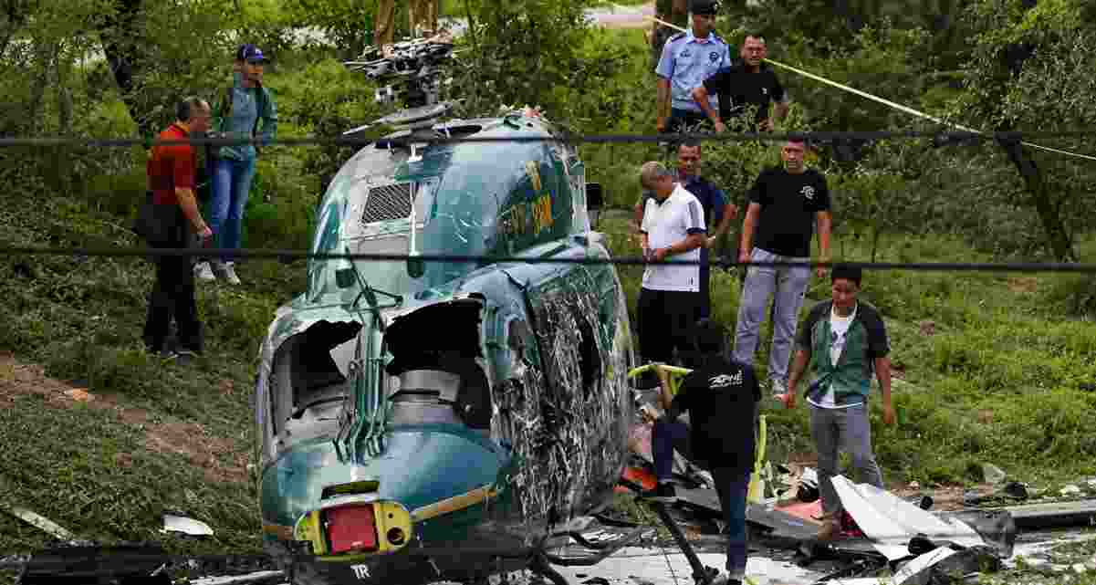 Rescue personnel respond after a Saudi Aramco helicopter crashed in Ras Tanura, Saudi Arabia, killing 14 people. Authorities have launched an investigation to determine the cause of the accident. Rescue personnel respond after a Saudi Aramco helicopter crashed in Ras Tanura, Saudi Arabia, killing 14 people. Authorities have launched an investigation to determine the cause of the accident.