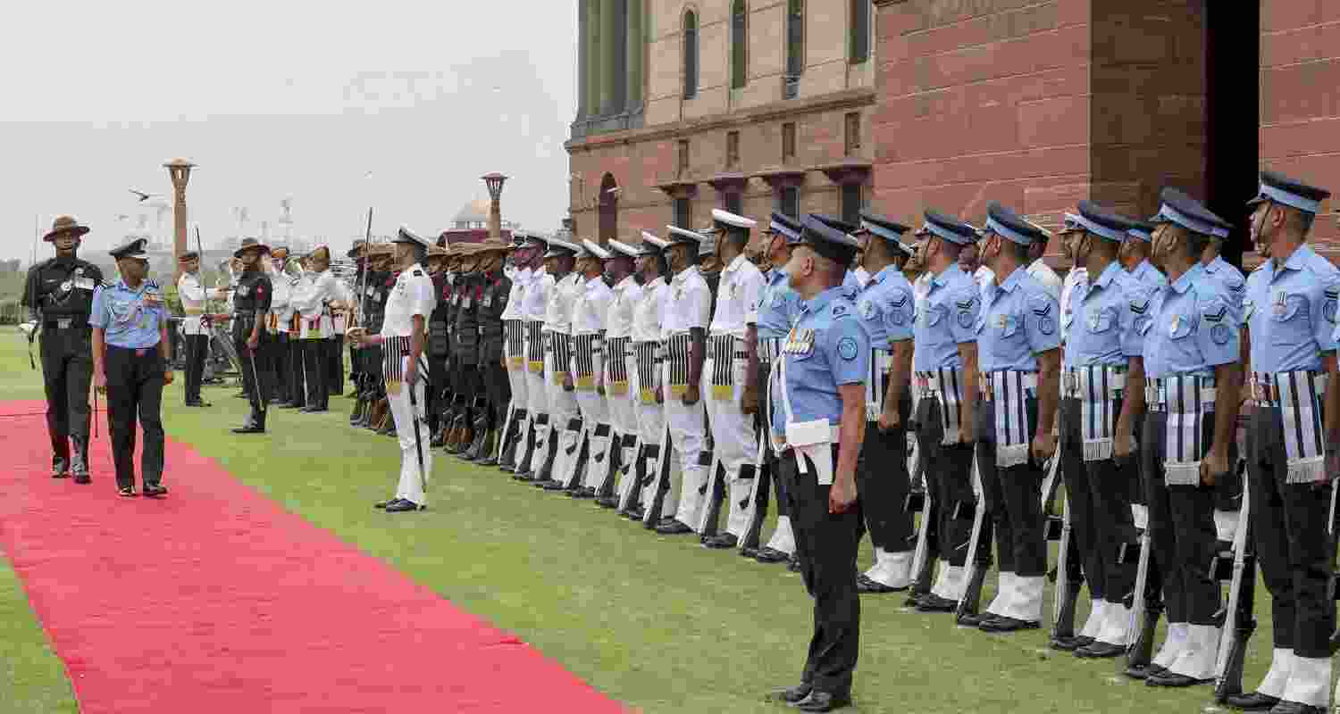 Chief of Integrated Defence Staff Air Marshal Ashutosh Dixit accorded a Guard of Honour as he relinquishes the appointment, in New Delhi.