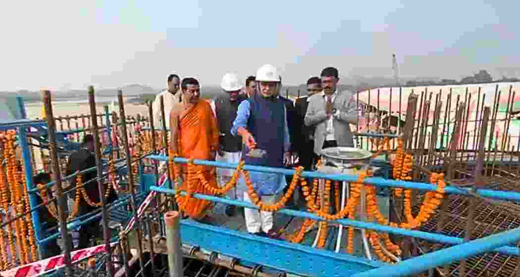 Himanta Biswa Sarma performing 'bhumi pujan' for the Palasbari-Sualkuchi bridge, calling it transformative for Brahmaputra's shores. The Rs 3,197.20 crore project aims for completion by June 2028.