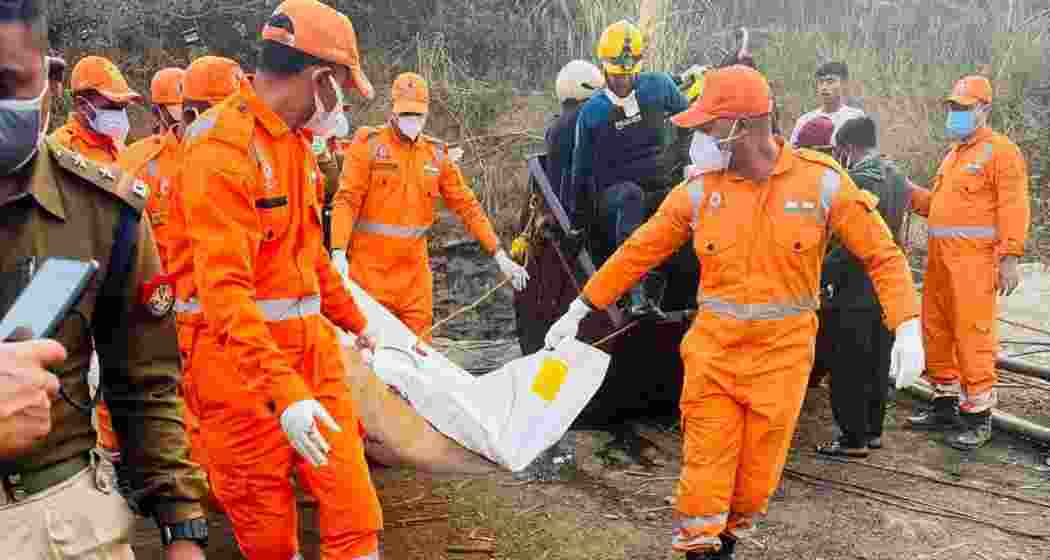 Rescue teams at the flooded rat-hole coal mine in Assam's Dima Hasao district, where the bodies of all nine trapped miners were recovered after 44 days of extensive operations. 