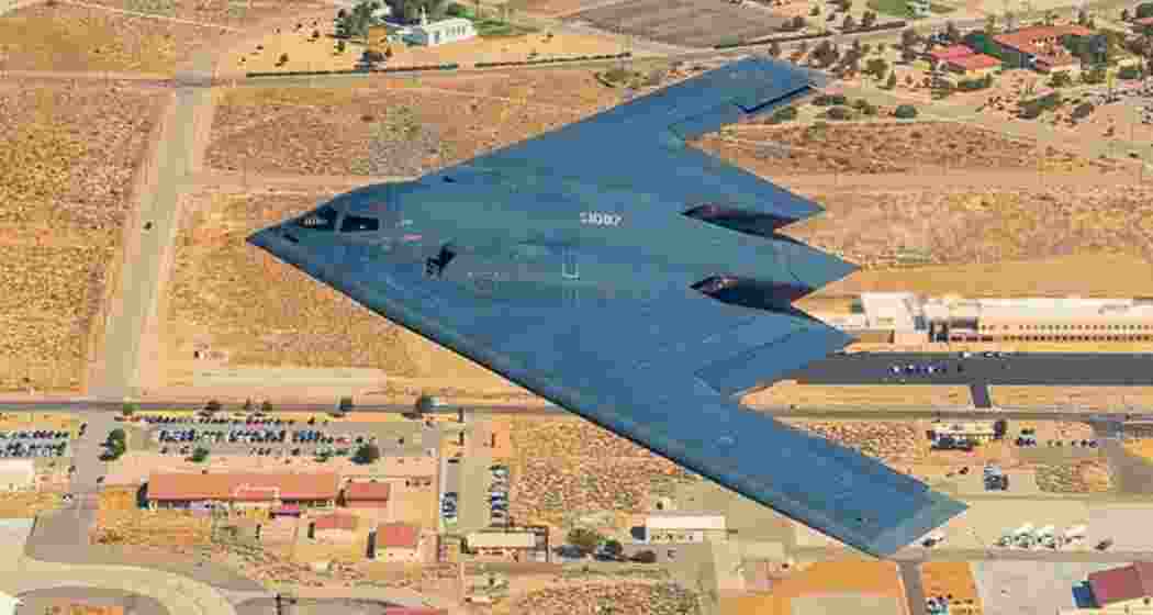 A US B-2 Spirit stealth bomber, capable of deploying powerful bunker-buster bombs, flies during a mission.
