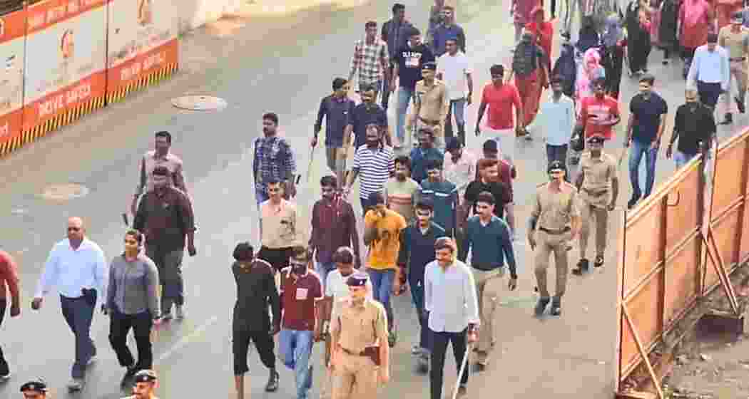 Security forces lead detained illegal immigrants in Gujarat after identifying them through forged identity papers during early morning coordinated raids in urban neighbourhoods on Saturday.