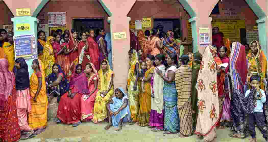 People wait in queues to cast their votes at a polling station during the second and final phase of the Bihar Assembly elections, in Jehanabad on Tuesday. People wait in queues to cast their votes at a polling station during the second and final phase of the Bihar Assembly elections, in Jehanabad on Tuesday.
