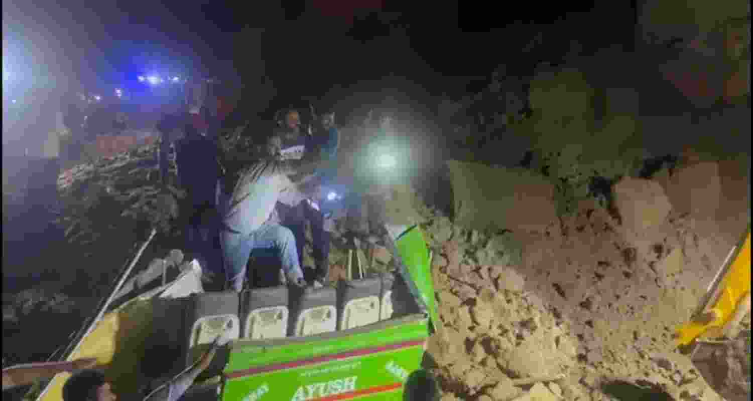 Rescue operations are underway after a bus was trapped under debris in Himachal Pradesh.