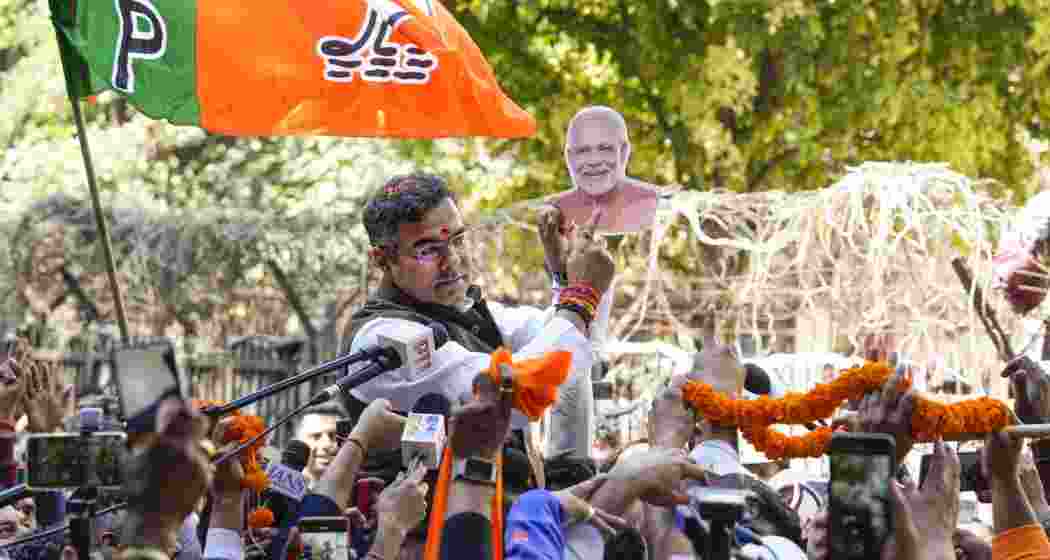 BJP candidate from New Delhi assembly constituency Parvesh Verma celebrates outside a counting center after claiming victory in the Delhi Assembly polls amid the counting of votes, in New Delhi on Saturday, Feb. 8, 2025. 