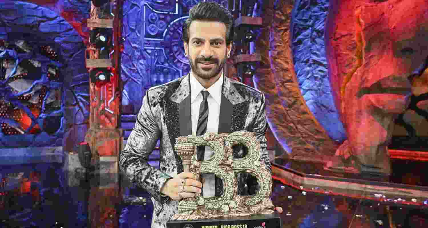 Karan Veer Mehra poses for photographs after he was declared winner of the show Bigg Boss 18, in Mumbai.