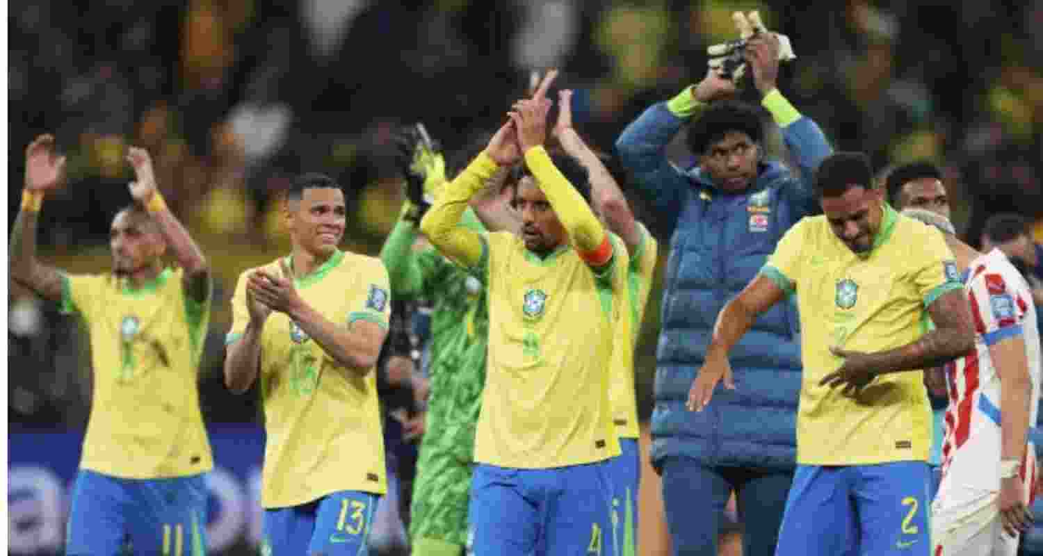 Brazil players celebrate after their World Cup-qualifying win over Paraguay.