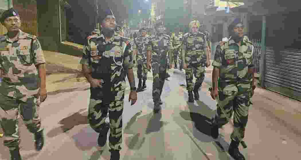 BSF personnel patrol Dhuliyan town in West Bengal's Murshidabad district following violent protests over the Waqf (Amendment) Act.