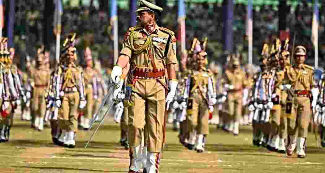 Personnel from the Central Armed Police Forces stand in formation during a ceremonial drill. Over one lakh vacancies exist in CAPFs and Assam Rifles, the government has confirmed. (File Photo)