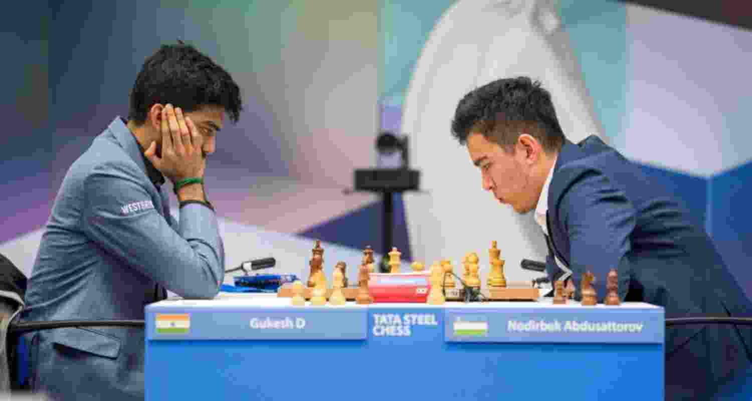 World champion D Gukesh and (right) Nodirbek Abdusattorov of Uzbekistan.