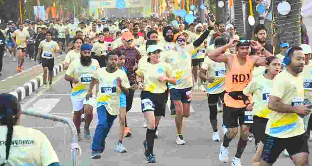 Runners take part in the Chandigarh International Marathon in Chandigarh on Sunday, with around 3,500 participants competing across full, half, 10-km and 5-km categories.