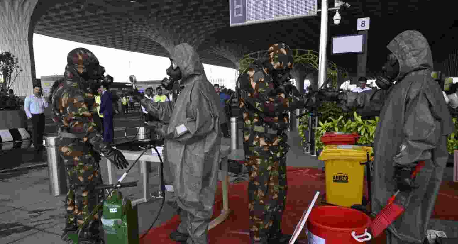 Picture of personnel during mock drill at Mumbai airport. 