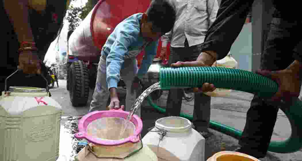 Residents fill water for their household needs from tankers in Bhagirathpura area of Madhya Pradesh’s Indore where several people died in December 2025. 