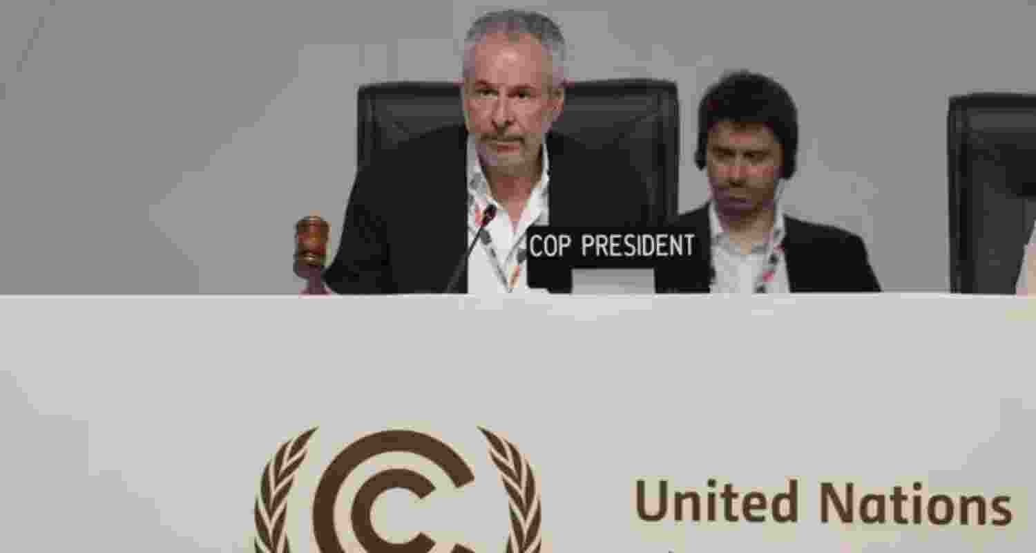 André Corrêa do Lago, COP30 president, bangs a gavel during a plenary session at the COP30 UN Climate Summit, Saturday.
