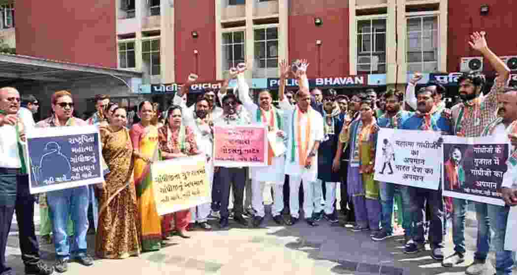 Congress leaders stage a protest against a play on Nathuram Godse in Gujarat’s Rajkot.