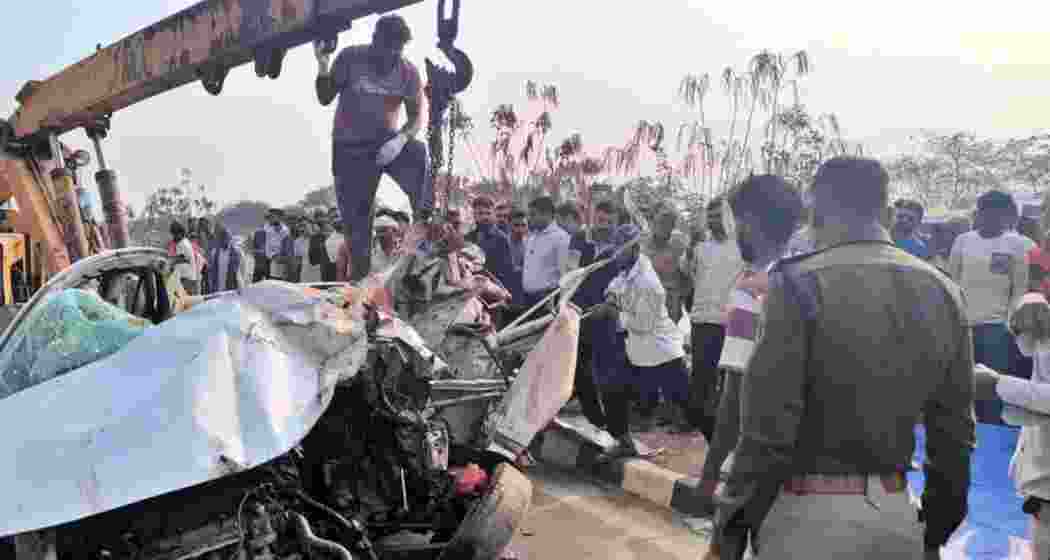 Rescue personnel conduct search and relief operations at the accident site in Dhamtari district on Saturday after a car carrying CoBRA commandos rammed into a stationary truck.