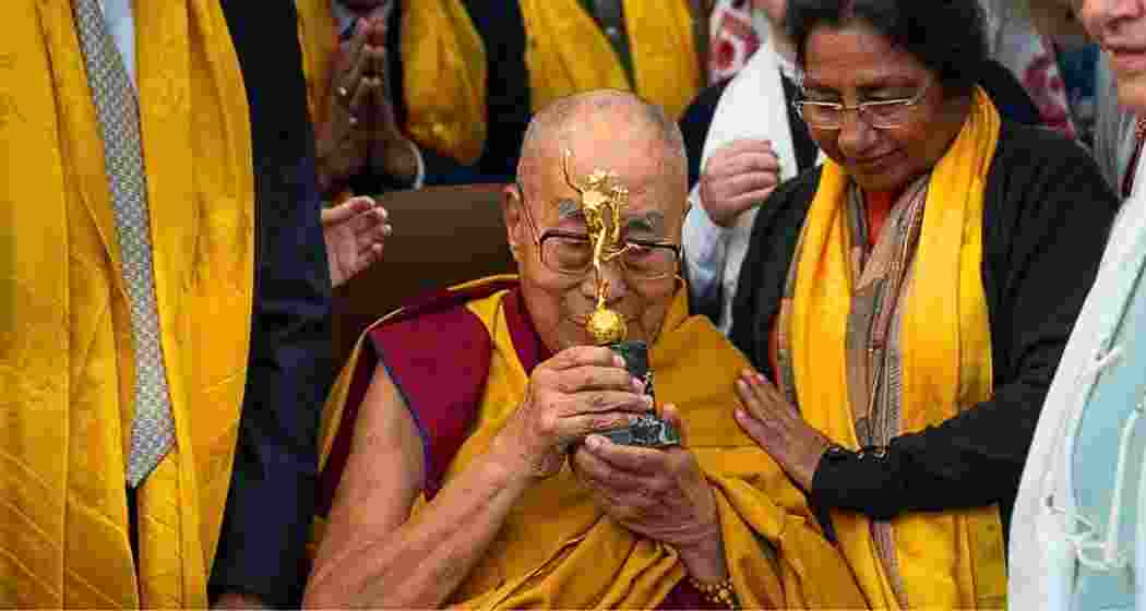 The Dalai Lama after receiving the Gold Mercury Award for Peace at his Dharamshala residence.