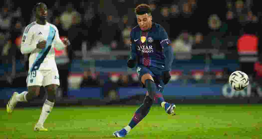 PSG forward Désiré Doué controls the ball during the match against Paris FC.