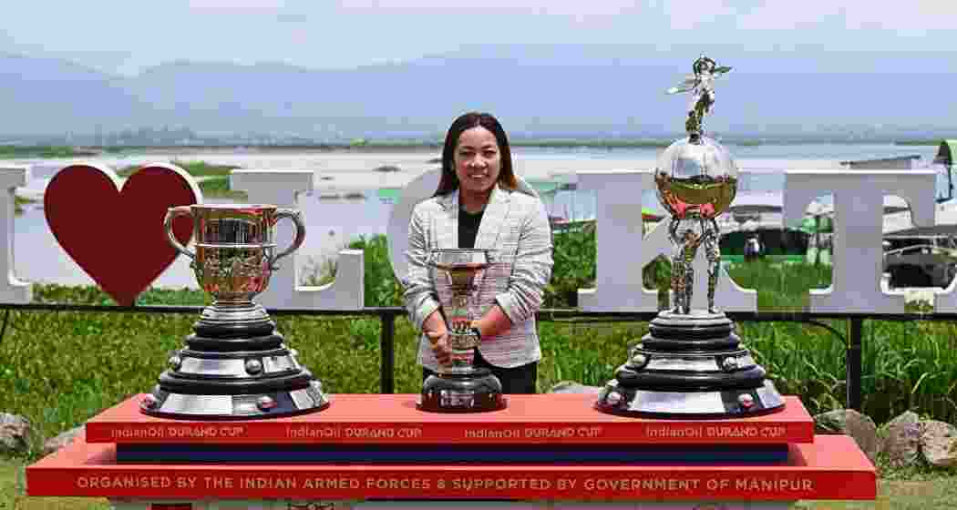 Indian weightlifter from Manipur, Mirabai Chanu, with the Durand Cup trophies in Imphal during the trophy tour.