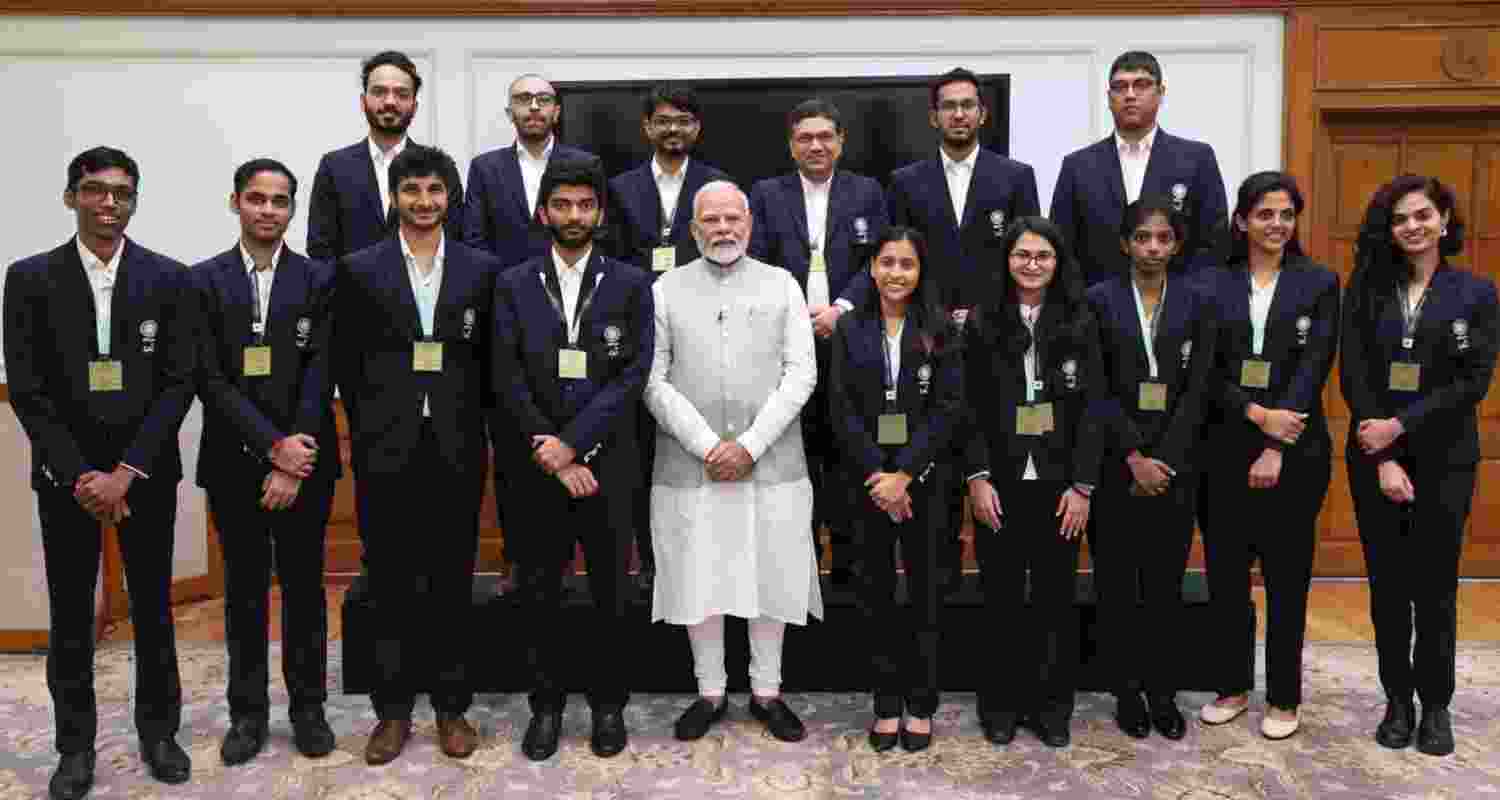 Prime Minister Narendra Modi posing with India's chess prodigies.