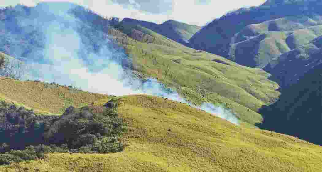 A wildfire in the southern Dzukou Valley in Nagaland’s Kohima district, from where over 30 trekkers were evacuated as containment operations continue.